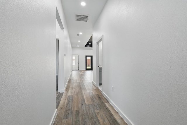 9413 Prairieview Dr, Fort Worth, TX 76134 - corridor with wood finished floors, baseboards, and recessed lighting