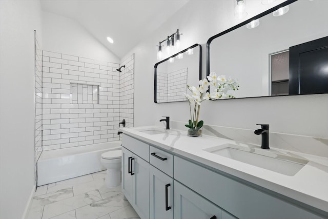 9413 Prairieview Dr, Fort Worth, TX 76134 - full bath featuring marble look tiles, toilet, lofted ceiling, bathing tub / shower combination, and double vanity