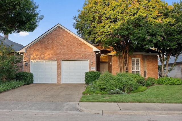 view of front of property with a garage, brick siding, concrete driveway, and a front lawn