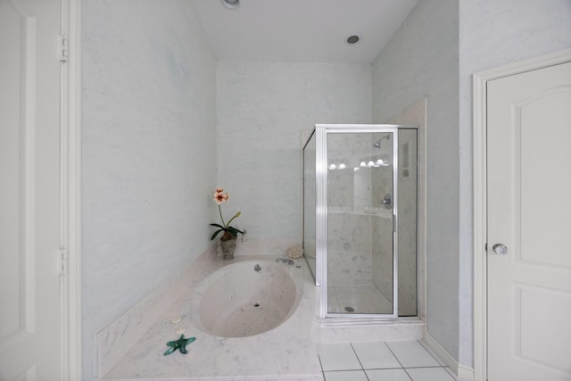full bath featuring a stall shower, tile patterned flooring, and a whirlpool tub