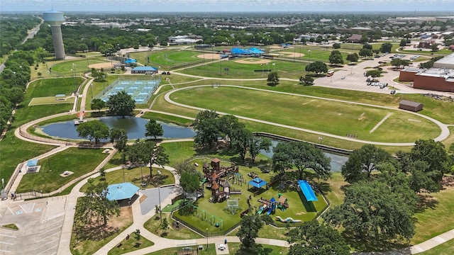 aerial overview of property's location featuring a nearby body of water and a recreational park