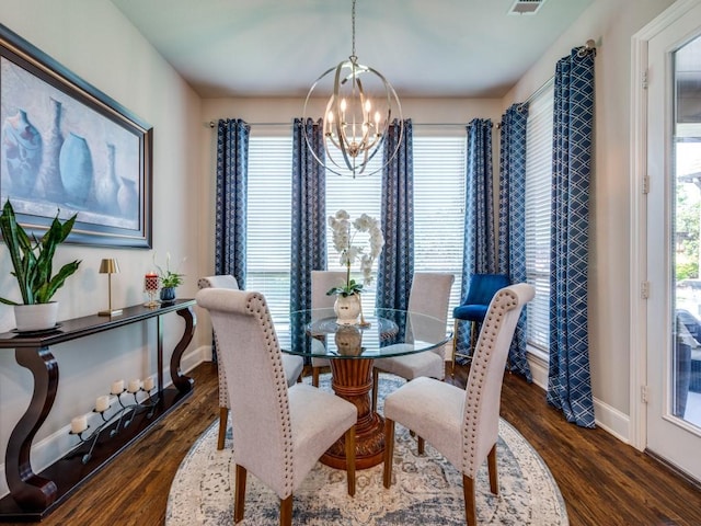 6209 Crystal Cove Ct, Mckinney, TX 75071 - dining room featuring a chandelier, wood finished floors, and baseboards