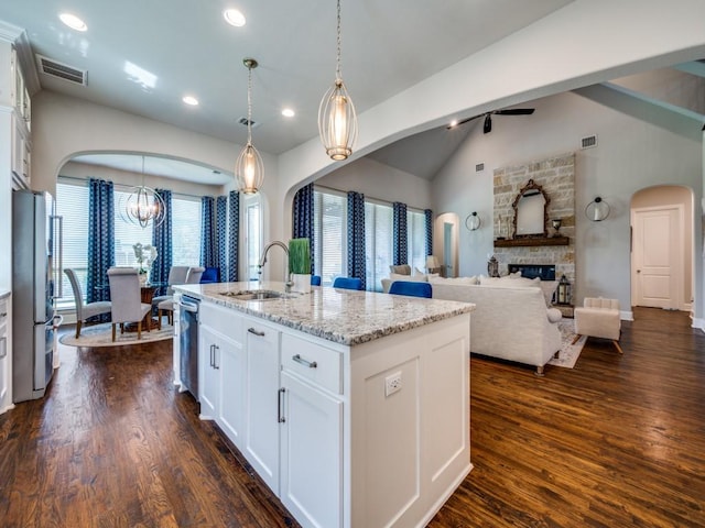 6209 Crystal Cove Ct, Mckinney, TX 75071 - kitchen featuring a sink, dark wood finished floors, white cabinetry, stainless steel appliances, and recessed lighting