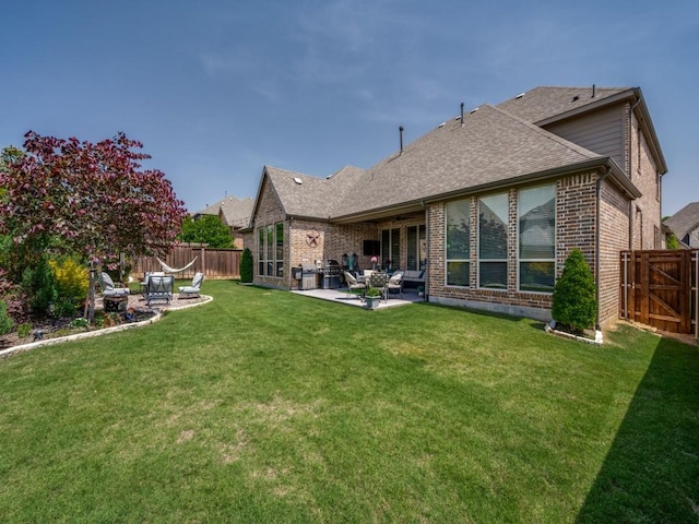 6209 Crystal Cove Ct, Mckinney, TX 75071 - back of house featuring a patio, brick siding, a shingled roof, and outdoor lounge area