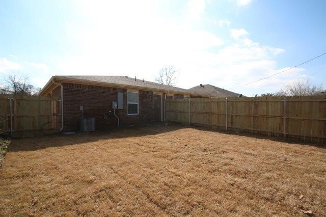 8036 Doreen Ave, Fort Worth, TX 76116 - back of house featuring brick siding