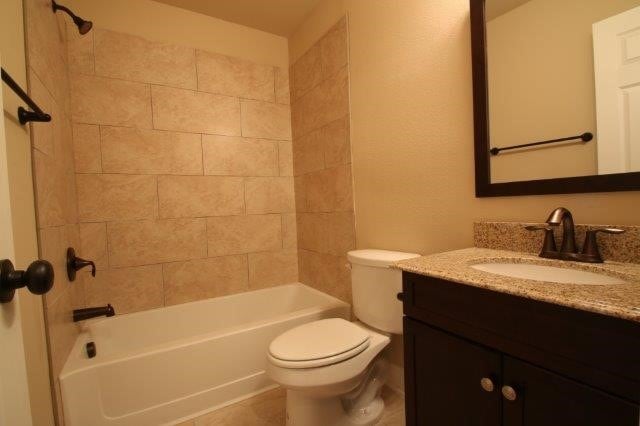 8036 Doreen Ave, Fort Worth, TX 76116 - full bath featuring toilet, vanity, and shower / bath combination
