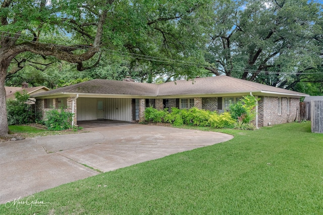5730 Lovers Ln, Shreveport, LA 71105 - single story home featuring a chimney, concrete driveway, an attached carport, and brick siding