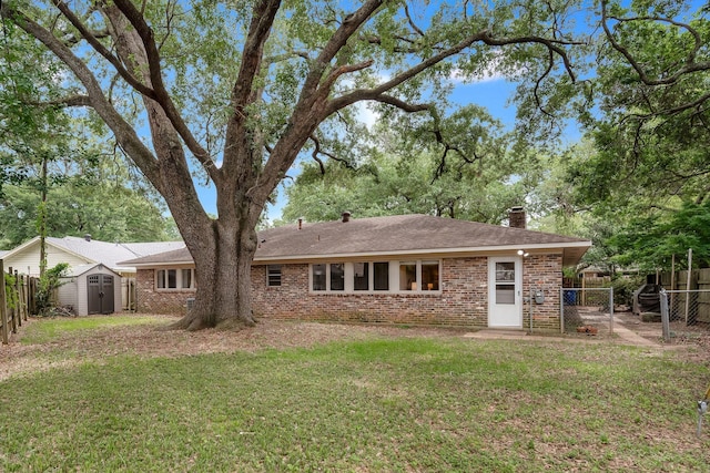 5730 Lovers Ln, Shreveport, LA 71105 - back of property featuring brick siding, a chimney, a gate, and a shingled roof
