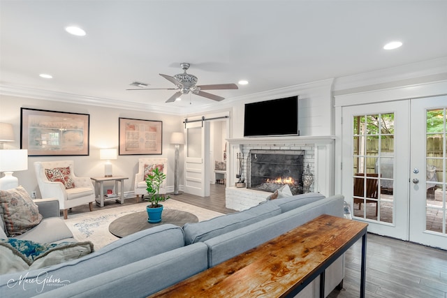 5730 Lovers Ln, Shreveport, LA 71105 - living area featuring ornamental molding, french doors, wood finished floors, recessed lighting, and ceiling fan