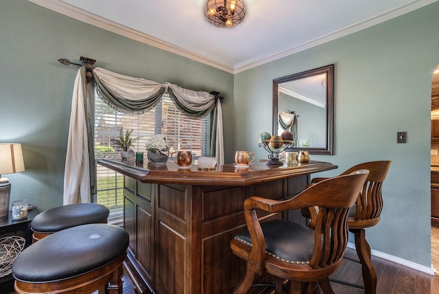 1516 Cheyenne Trl, Mansfield, TX 76063 - bar area featuring ornamental molding, baseboards, and dark wood-type flooring