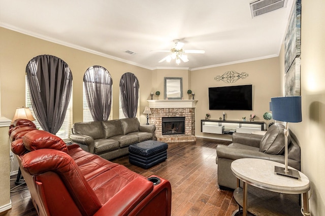 1516 Cheyenne Trl, Mansfield, TX 76063 - living area with ceiling fan, dark wood finished floors, a fireplace, and crown molding
