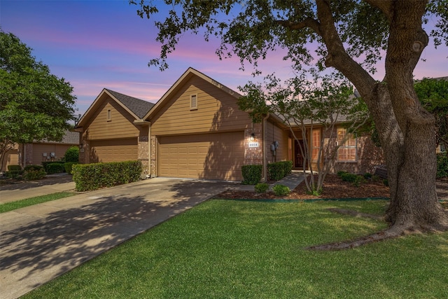 9904 Kaufman Pl, Plano, TX 75025 - ranch-style house featuring an attached garage, driveway, a front yard, and brick siding