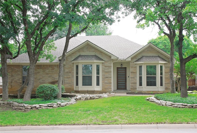 6700 Canalview Dr, Arlington, TX 76016 - view of front of home with roof with shingles, a front yard, brick siding, and a chimney