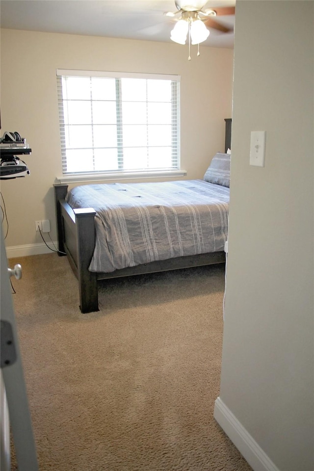 6700 Canalview Dr, Arlington, TX 76016 - carpeted bedroom featuring multiple windows, baseboards, and ceiling fan