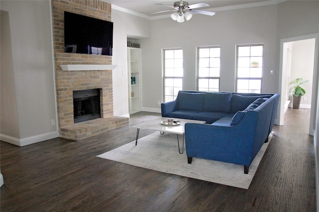 6700 Canalview Dr, Arlington, TX 76016 - living area with a ceiling fan, baseboards, crown molding, built in shelves, and wood finished floors
