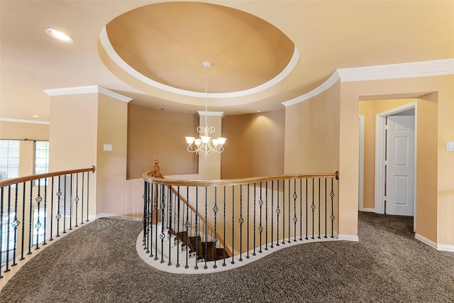 905 Sonora Dr, Allen, TX 75013 - corridor with crown molding, an upstairs landing, a chandelier, carpet, and recessed lighting