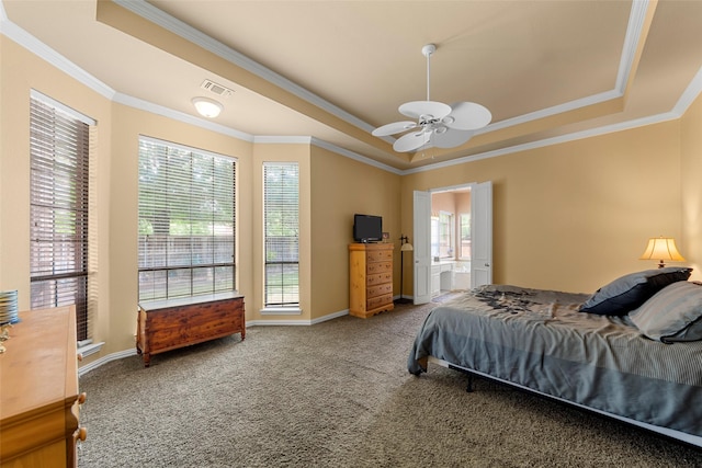 905 Sonora Dr, Allen, TX 75013 - carpeted bedroom featuring a tray ceiling, crown molding, ensuite bathroom, and a ceiling fan