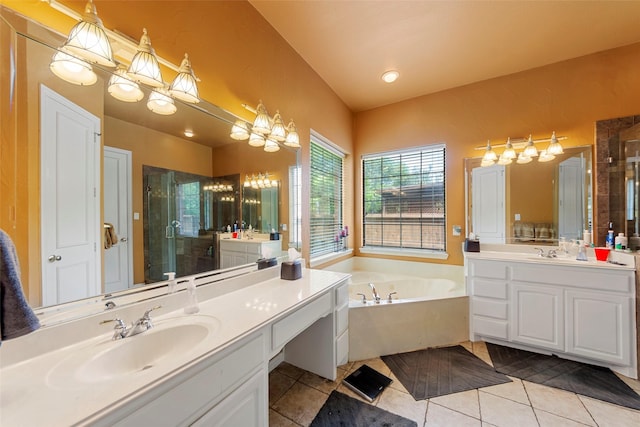 905 Sonora Dr, Allen, TX 75013 - bathroom with two vanities, a shower stall, a garden tub, tile patterned flooring, and a chandelier