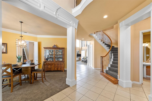 905 Sonora Dr, Allen, TX 75013 - dining room with light tile patterned flooring, stairway, ornamental molding, a chandelier, and recessed lighting