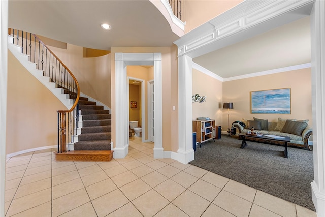 905 Sonora Dr, Allen, TX 75013 - living room featuring light tile patterned flooring, stairs, recessed lighting, and crown molding