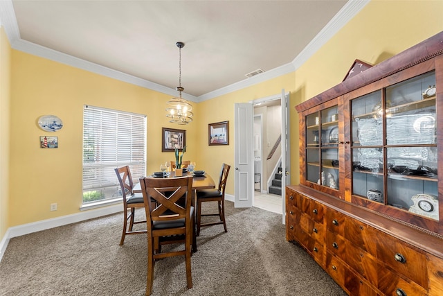 905 Sonora Dr, Allen, TX 75013 - dining space with carpet flooring, a chandelier, ornamental molding, and stairs