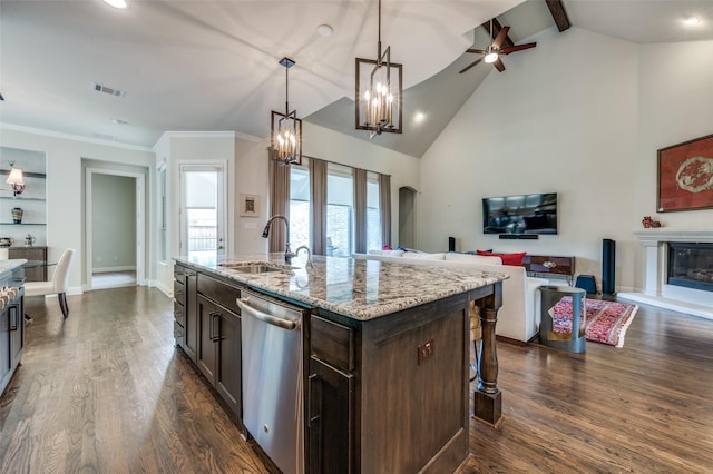 4388 Argyle Ln, Frisco, TX 75034 - kitchen featuring stainless steel dishwasher, a sink, open floor plan, dark brown cabinetry, and dark wood-style floors