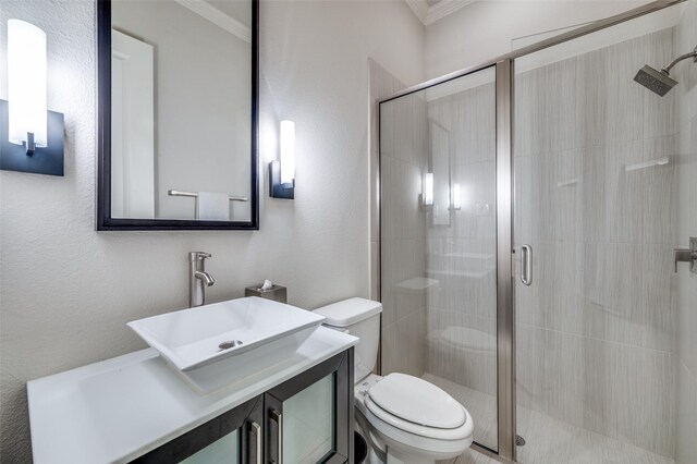 4388 Argyle Ln, Frisco, TX 75034 - bathroom with crown molding, a stall shower, and vanity