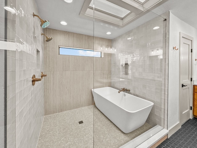 1551 Lower Tonk Valley Rd, Graham, TX 76450 - full bath featuring a tile shower, recessed lighting, and a freestanding tub