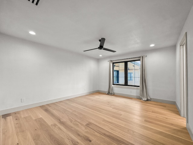 1551 Lower Tonk Valley Rd, Graham, TX 76450 - unfurnished room featuring wood finished floors, recessed lighting, a ceiling fan, and baseboards