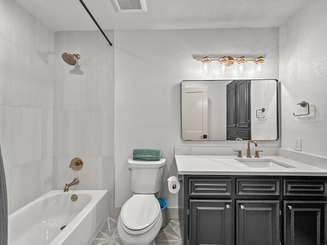 1551 Lower Tonk Valley Rd, Graham, TX 76450 - full bath featuring toilet, shower / bathtub combination, vanity, and tile patterned floors