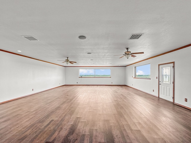 1551 Lower Tonk Valley Rd, Graham, TX 76450 - empty room featuring ornamental molding, ceiling fan, light wood-style flooring, and baseboards