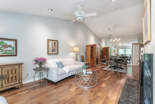 5158 Westgrove Dr, Dallas, TX 75248 - living room featuring high vaulted ceiling, a chandelier, wood finished floors, ceiling fan, and baseboards
