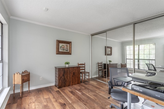 5158 Westgrove Dr, Dallas, TX 75248 - home office with wood finished floors, a textured ceiling, crown molding, and baseboards