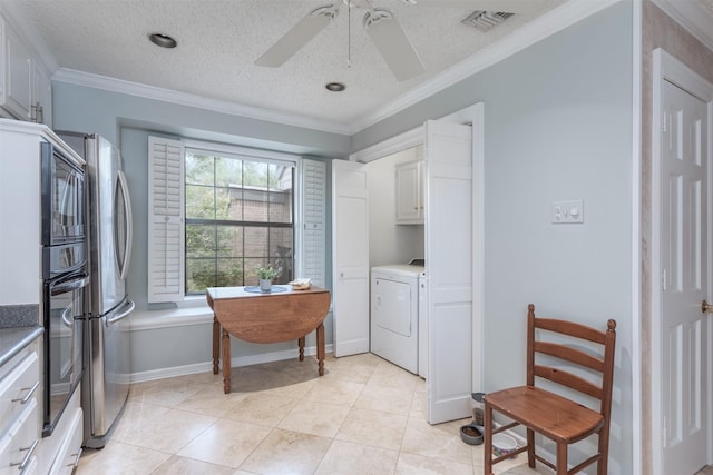 5158 Westgrove Dr, Dallas, TX 75248 - kitchen featuring washer / dryer, ceiling fan, ornamental molding, freestanding refrigerator, and white cabinetry