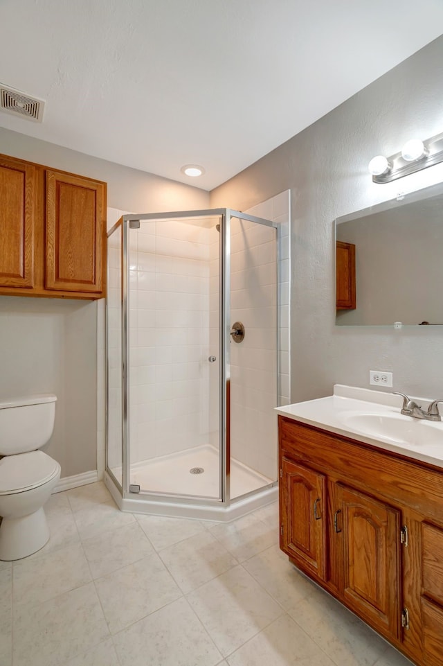 313 W 7th St, Irving, TX 75060 - full bath featuring toilet, a stall shower, tile patterned floors, and vanity