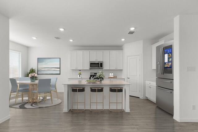 3008 Balmorhea Ln, Mckinney, TX 75071 - kitchen with appliances with stainless steel finishes, light countertops, baseboards, backsplash, and recessed lighting