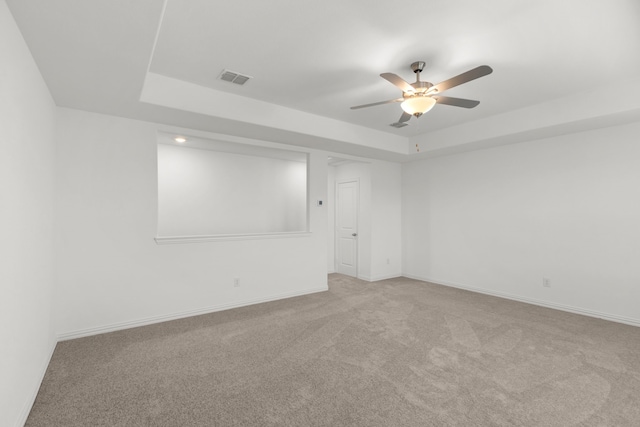 3008 Balmorhea Ln, Mckinney, TX 75071 - carpeted spare room with a raised ceiling, ceiling fan, and baseboards