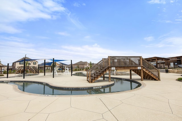 3008 Balmorhea Ln, Mckinney, TX 75071 - community pool featuring stairway, a residential view, and a patio area