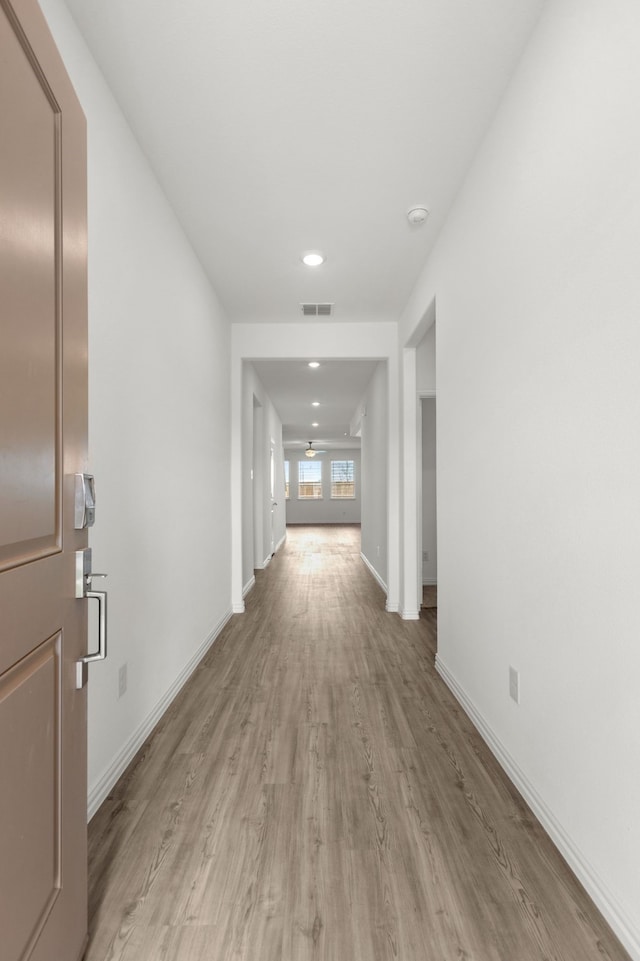 3008 Balmorhea Ln, Mckinney, TX 75071 - hall featuring light wood-type flooring, baseboards, and recessed lighting