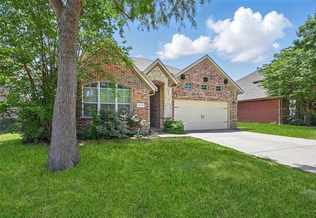 10313 Colfax Dr, Mckinney, TX 75072 - view of front of home featuring concrete driveway, a front yard, an attached garage, and brick siding
