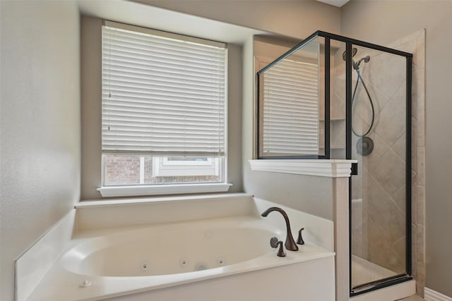 10313 Colfax Dr, Mckinney, TX 75072 - bathroom featuring a shower stall and a tub with jets