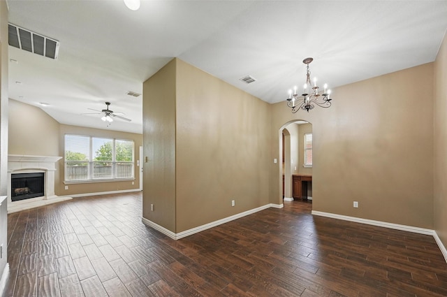 10313 Colfax Dr, Mckinney, TX 75072 - unfurnished dining area with arched walkways, ceiling fan, wood finished floors, baseboards, and a premium fireplace