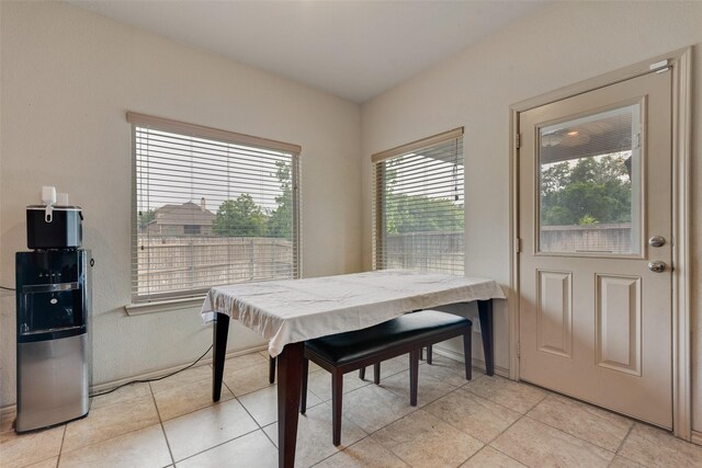 6712 Eliza Dr, Arlington, TX 76001 - dining space with light tile patterned floors