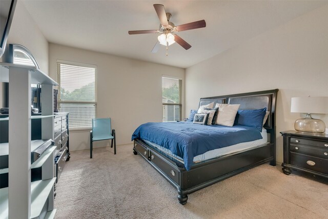 6712 Eliza Dr, Arlington, TX 76001 - carpeted bedroom featuring a ceiling fan