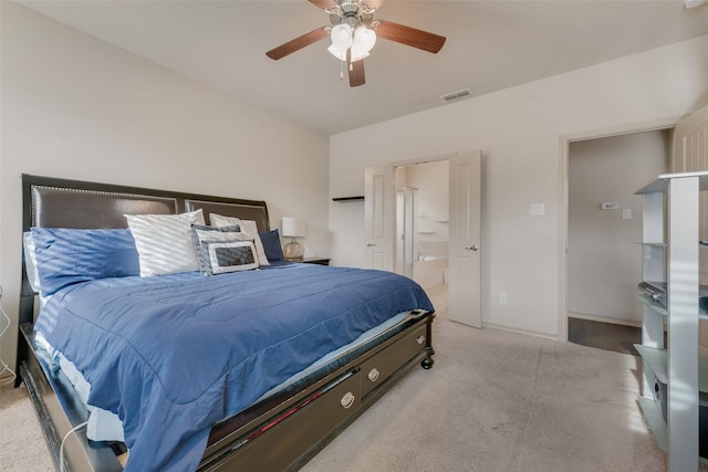 6712 Eliza Dr, Arlington, TX 76001 - carpeted bedroom with baseboards, ensuite bathroom, and ceiling fan