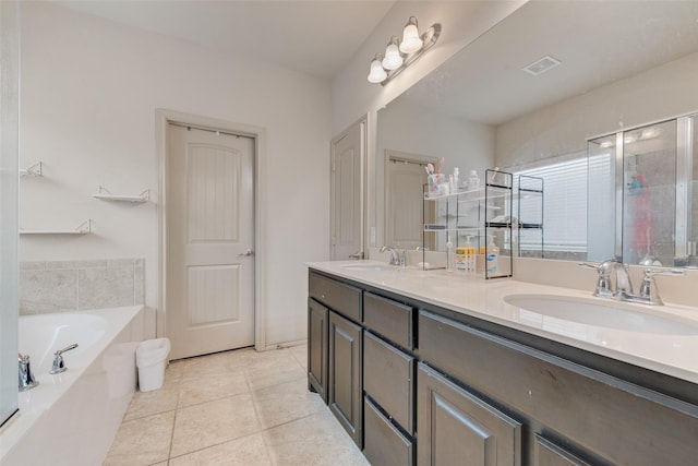 6712 Eliza Dr, Arlington, TX 76001 - full bath featuring double vanity, a garden tub, tile patterned floors, and an enclosed shower