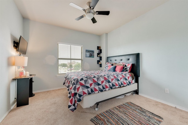 6712 Eliza Dr, Arlington, TX 76001 - bedroom with carpet flooring, baseboards, and ceiling fan