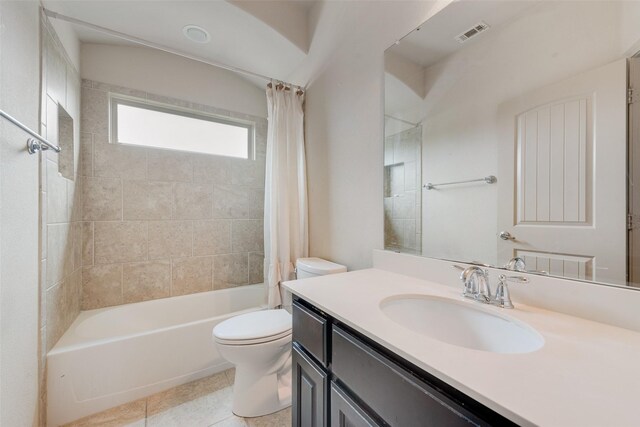 6712 Eliza Dr, Arlington, TX 76001 - bathroom with toilet, shower / bath combo, vanity, and tile patterned flooring