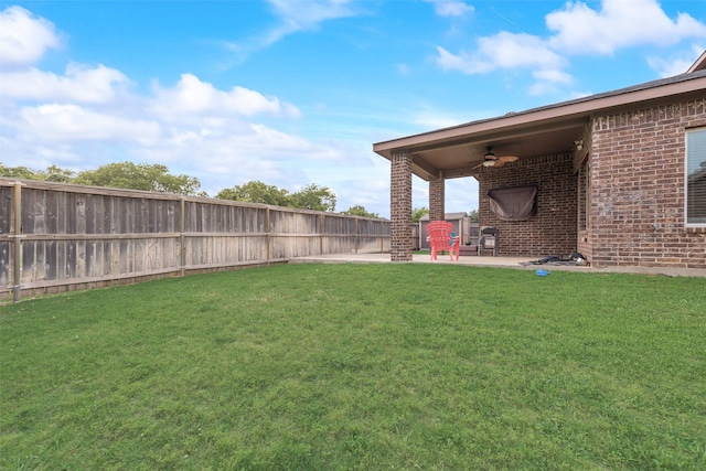 6712 Eliza Dr, Arlington, TX 76001 - view of yard with a ceiling fan and a patio