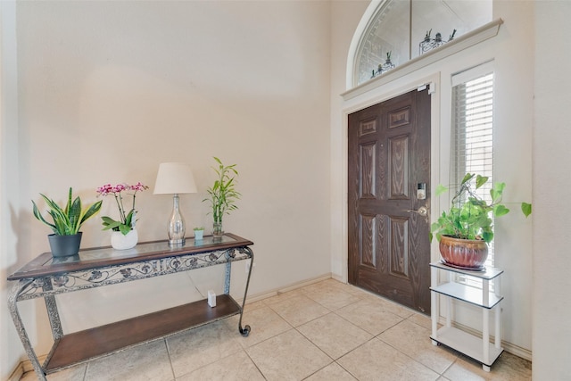 6712 Eliza Dr, Arlington, TX 76001 - foyer with light tile patterned flooring and baseboards